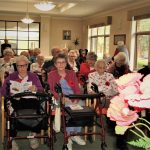 Anzac Story Presentation with residents listening